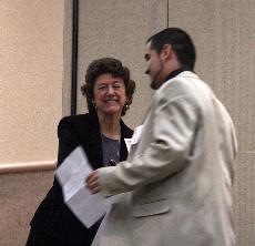 Skyline College President Victoria Morrow congradulating Daniel Tostado, winner of the 2006 UCSC scholarship. (Virginia Rosales)
