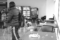 A Skyline student walks away from her table of trash, leaving someone else to clean it up. (Sarah E. Markoff)