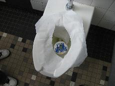 A copy of Soulja Boys CD floats in the toilet as more teens convert to digital downloading ()