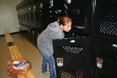 Skyline student, Rosa Pumacayo, empties her locker after recent locker-room thefts. (Brenda Cancino)