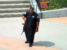 Police and SWAT members patrolled the campus with heavy weaponry, attempting to determine if shooters are still on campus. ()