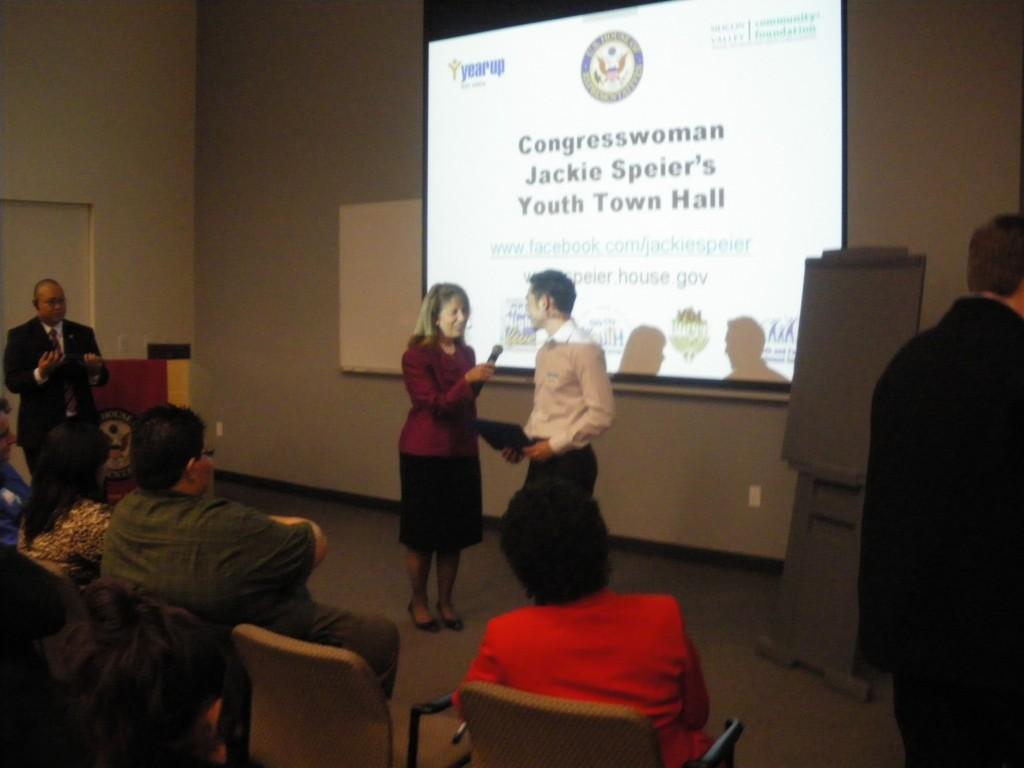 Jackie Speier speaks to a veteran at her town hall (Stephen Benoit)