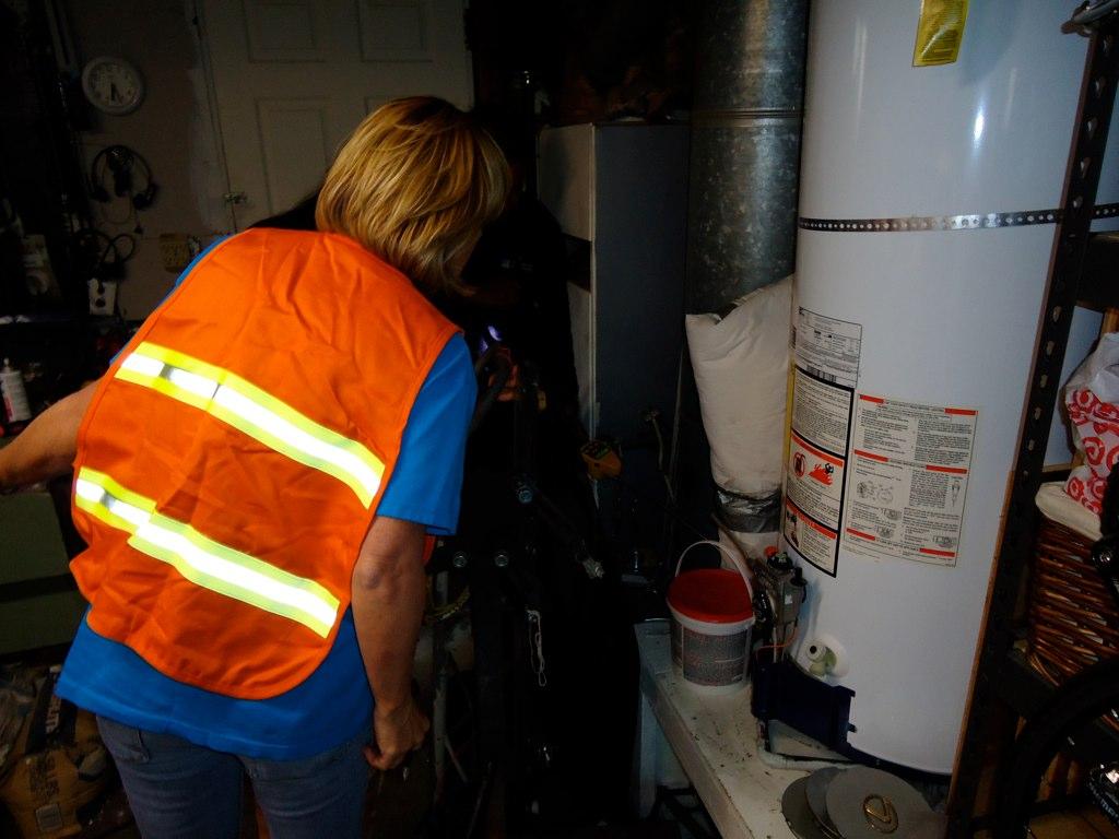 PG&E Workers check for gas leaks in a residence. (Larry Crystal)