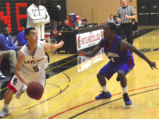 Sophomore Guard Kyle Wong drives to the basket pasy an Alameda defender. 