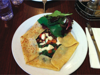 This garlic and beef bacon pizza crepe was delicious. (Lauren Concon)