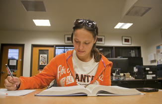 Early childhood education student Karlla Silva studies her algebra textbook.
