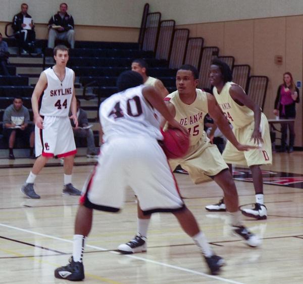 Skyline’s Aaron Brown (40) searches for an opening against De Anza’s wing Abu Tratter (15)