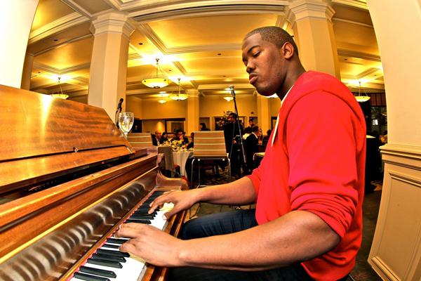 DeShawn Davis plays a wide variety of instruments, including the piano.