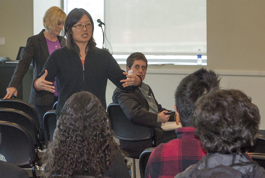 English professor Karen Wong leads a discussion regarding Student Learning Outcomes.