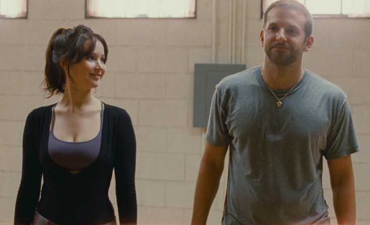 Jennifer Lawrence (left) and Bradley Cooper (right)