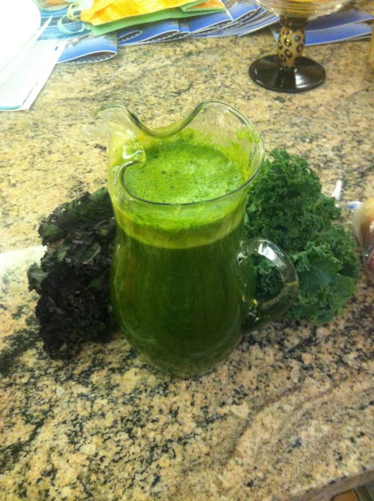 Juice with dandelion greens, red kale, green kale, pineapple, carrots and apple.