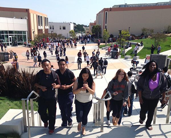 Both old and new Skyline College students going to their next class on the first day back of Fall of 2013. 
