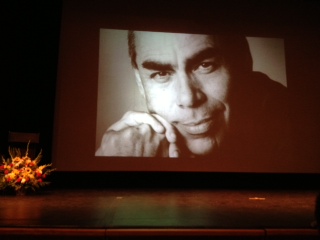 A picture of Jimmy Santiago Baca displayed via project at the Skyline Theater as students were still finding seats. 