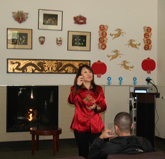 Hui Pate addresses students during the Chinese New Year Celebration.