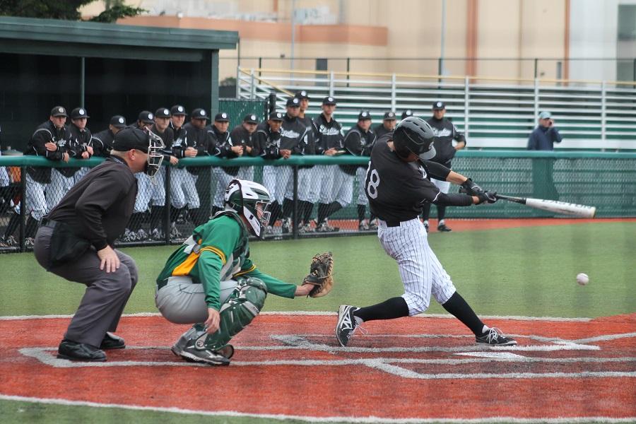 Nobuaki Suzuki batting against Canada College's pitcher, Joe Marcucci on March 25, 2014. Photo credit: Renee Abu-Zaghibra