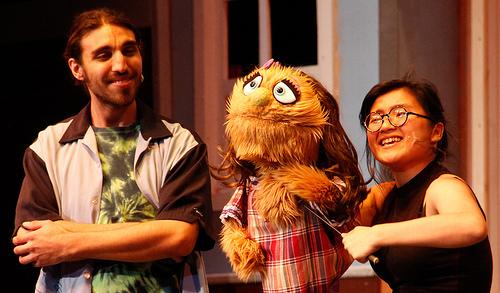 Alex Rosales (Left, Brian in the play), and Louisse Germonimo (Right, playing Kate in the play. at rehearsal in the play Avenue Q. At Rehearsal for Avenue Q on Tuesday April. 22, 2014.