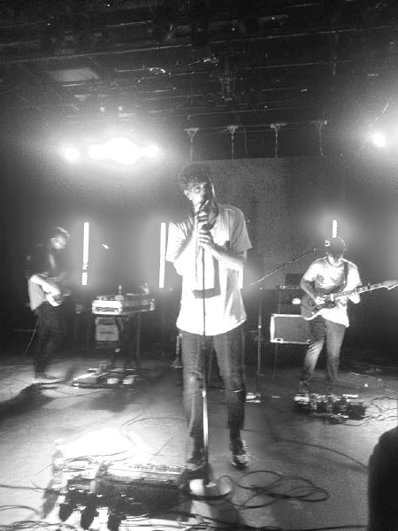 Lead singer Landon Jacobs (center) takes center stage at a concert in Sacramento Calif. on Aug. 13. (bassist Jason Suwito on right)