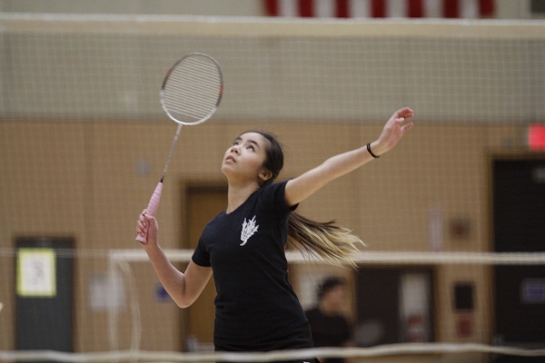 Trojans player MJ Phan getting ready to hit the shuttlecock during the March 7 tournament.  