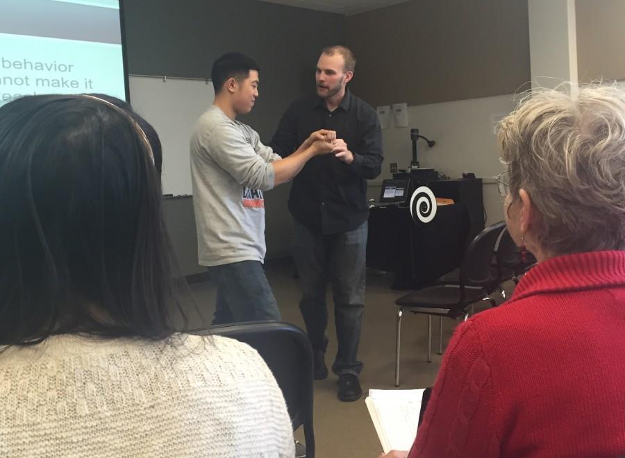 During his sexual assault prevention presentation Not Anymore Robert Hackenson enlisted the help of student Dylan Velasquez. After writing Dylan name on a piece of paper, Hackenson had him hold onto it while the audience repeated the word respect. The presentation took place in building 4 on April 16.  