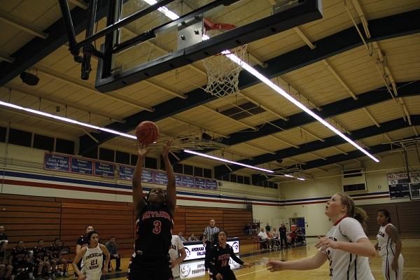 Skyline Trojan, Stephanie Allen, shooting a basket during the womens playoffs at American River College on Feb. 24, 2016.