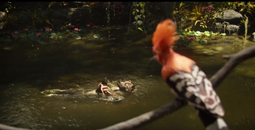 A screenshot of Mowgli and Baloo floating along the river singing Bear Necessities.