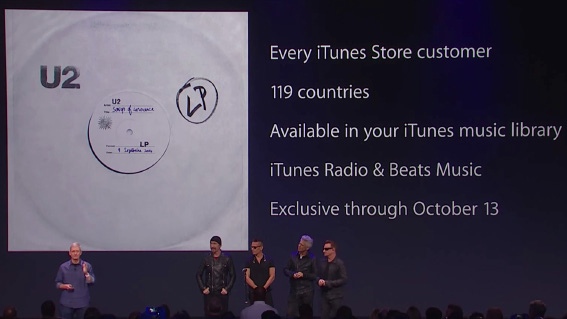 Screenshot from Apple’s Sept. 14, 2014 event, introducing U2’s automatic download of their album, “Songs of Innocence,” available in everyone’s iTunes music library.