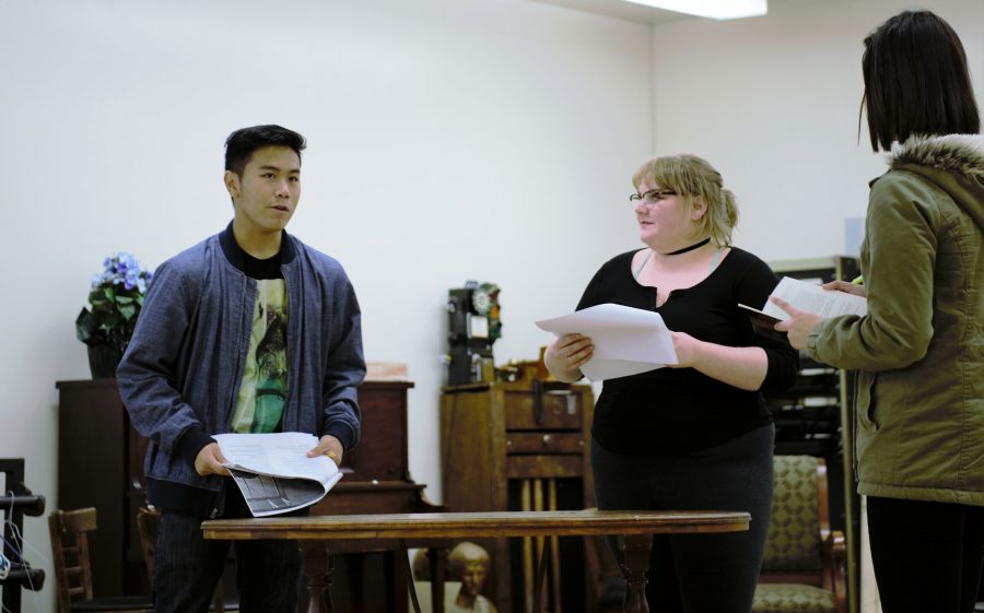 Cast members rehearse lines for upcoming play “Middletown”.