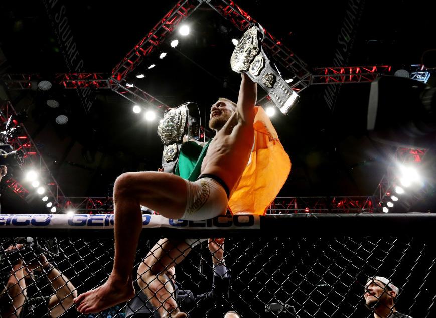 Conor McGregor of Ireland celebrates his KO victory over Eddie Alvarez of the United States in their lightweight championship November 12, 2016 in New York City.