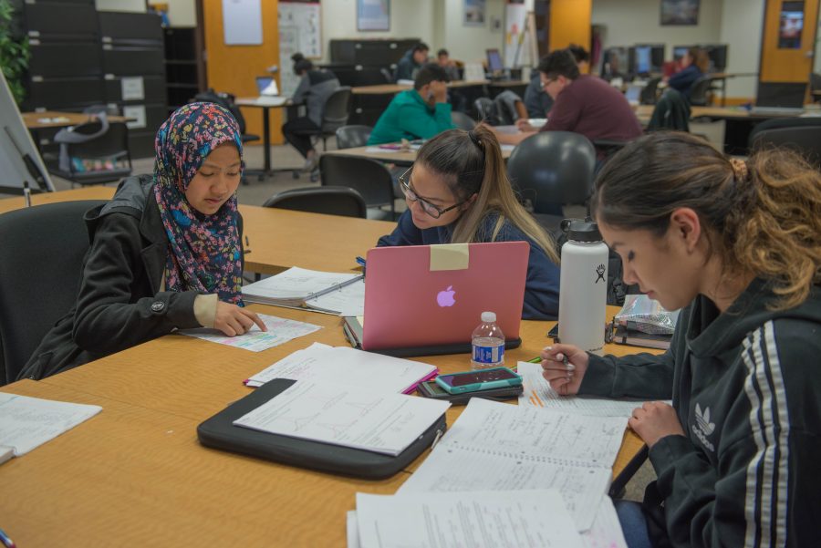 Guadalupe Salinas (right), Nuv Kamarulzaman (left), and Tabitha Wong (center) are studying at the Learning Center for statistics on Mar. 22, 2017. 