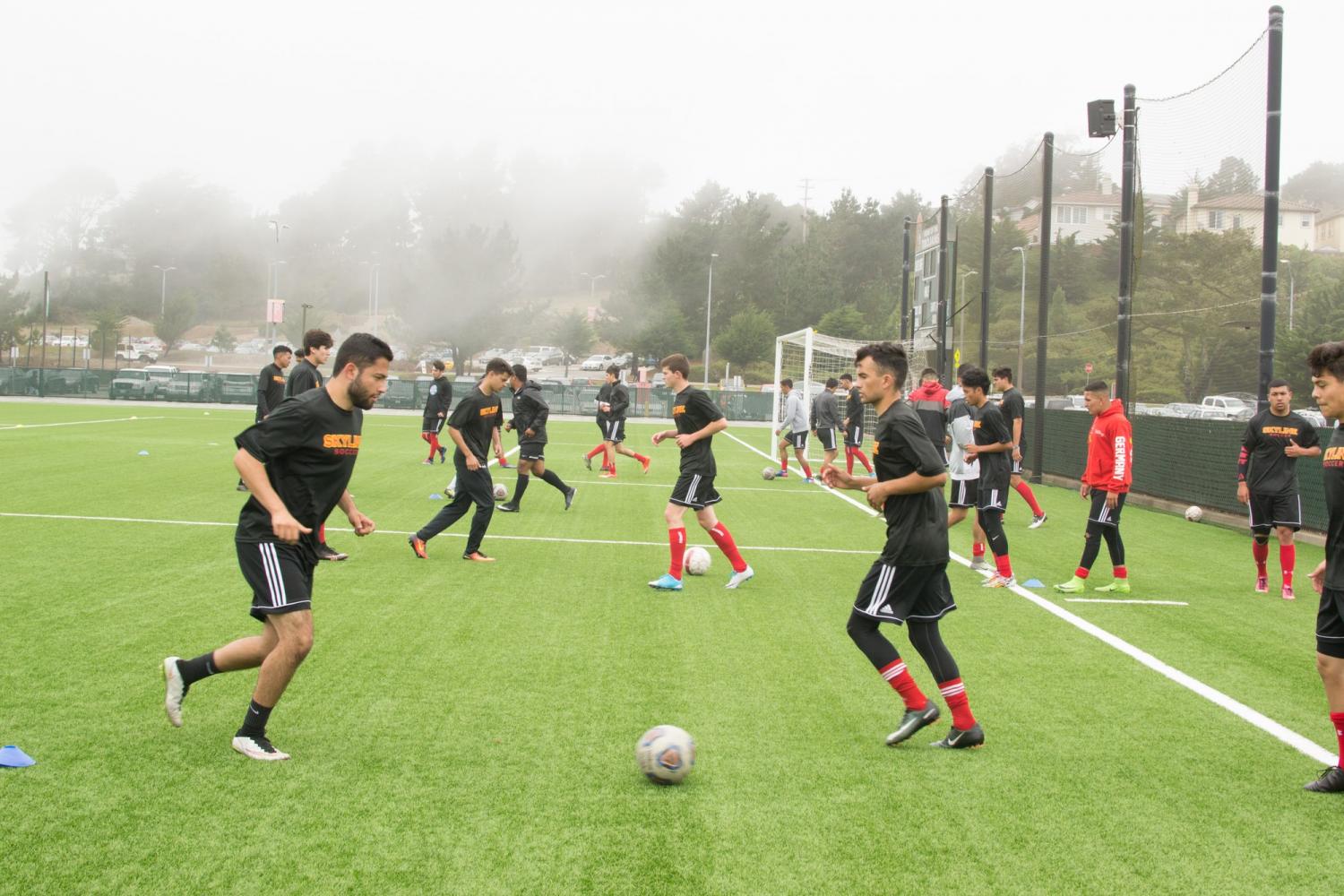 The Trojans warming up for an intense practice on August 24, 2017. 