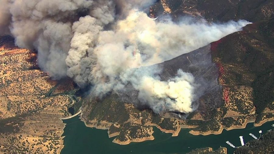 Deadly wildfire brushing up smoke and death