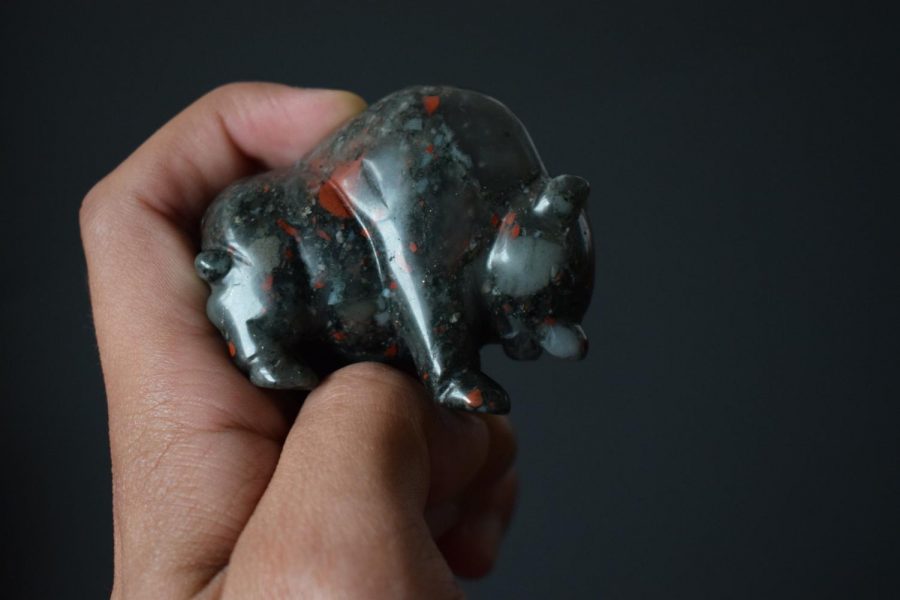 A carved buffalo made from heliotrope jasper being held on Nov. 8, 2017.