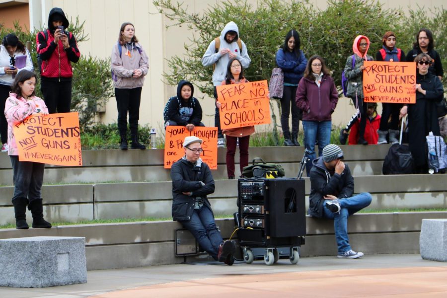 Members of Skyline College take a 17-minute moment of silence to honor the 17 victims of the Marjory Stoneman Douglas High School shooting on March 14, 2018, one month following the tragedy.