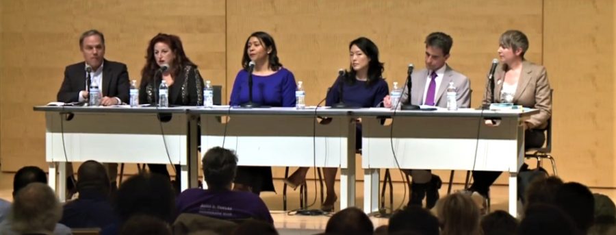 From left to right, SF Chronicle Editorial Page Editor and moderator John Diaz and mayoral candidates Angela Alioto, London Breed, Jane Kim, Mark Leno and Amy Farah Weiss talk about plans for the city in front of a crowd of many undecided voters in the basement of the San Francisco Public Library on Feb. 3, 2018.