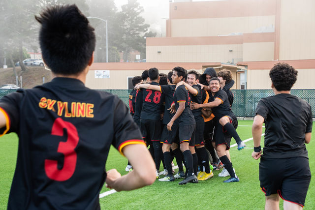 The Skyline team celebrates their third goal of the game before continuing with the game on Oct. 16, 2018.