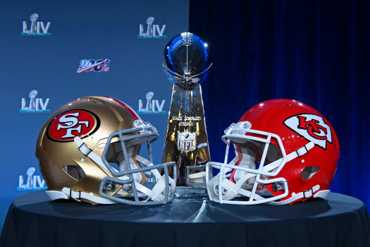 MIAMI, FL -  JANUARY 29: Photo of the Vince Lombardi Trophy presented next to the San Francisco 49ers and Kansas City Chiefs helmets during the NFL’s annual Super Bowl press conference in Miami, Florida, on Wednesday, Jan. 29, 2020. The San Francisco 49ers will play the Kansas City Chiefs in Super Bowl LIV on February 2. (Jose Carlos Fajardo/Bay Area News Group)