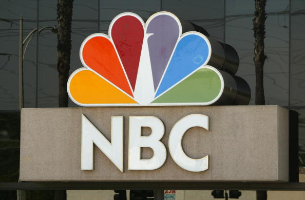 BURBANK, CA - AUGUST 28:  The NBC peacock logo is seen on the NBC studios building August 28, 2003 in Burbank, California. Paris-based Vivendi is in the final stages of a long and drawn-out auction of its U.S.-based media assets, collectively known as Vivendi Universal Entertainment, or VUE. NBC is an auction favorite.  (Photo by David McNew/Getty Images)