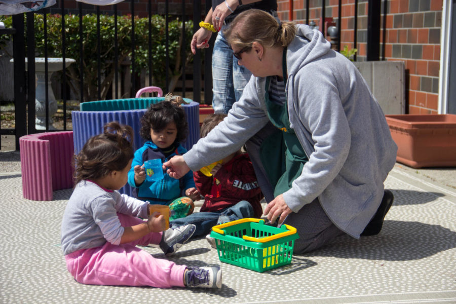 Toddlers playing with a Loma Chica staff way back in 2016.