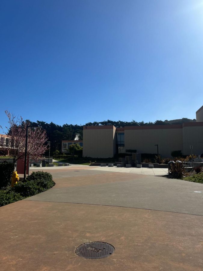 The empty courtyard at Skyline Colleges campus in San Bruno, CA at noon showcases declining enrollment.