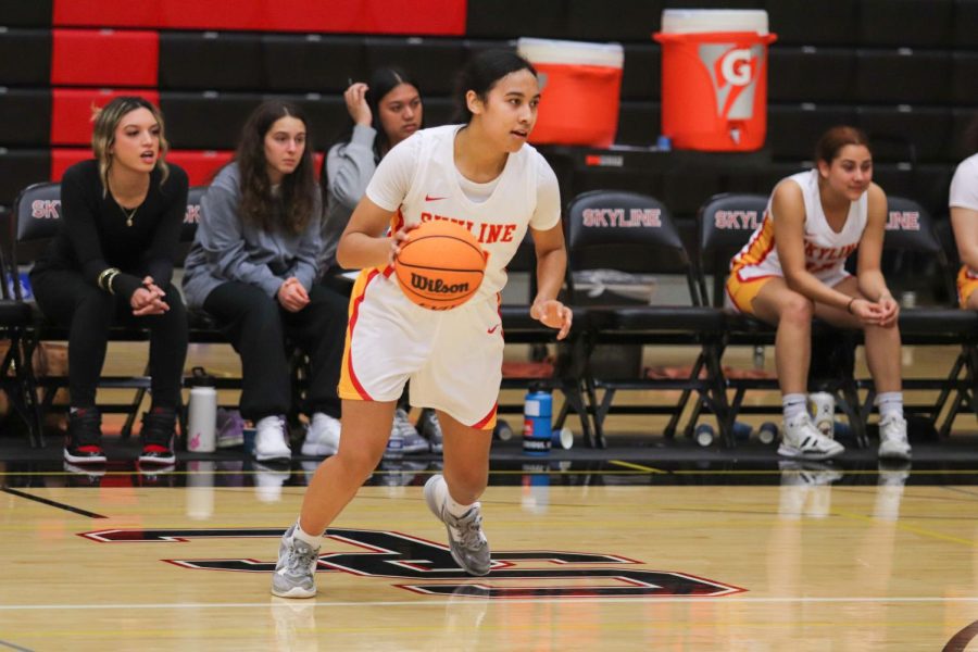 Lala Lautaimi dribbles the ball at a home game against Ohlone College on Feb 8.
