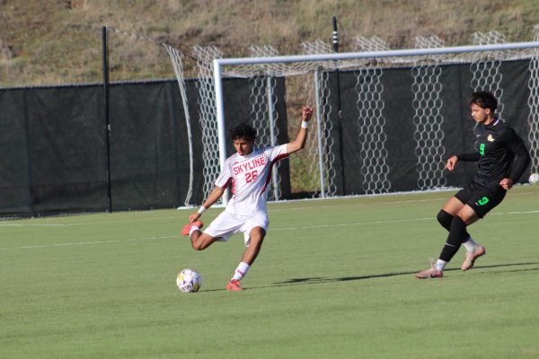 Skyline freshman defender David Vasquez looks to pass the ball up the field.