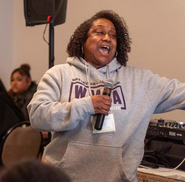 Professor Danielle Powell emcees at WMLA's Spring Empowered to Lead Retreat in March 2025. 