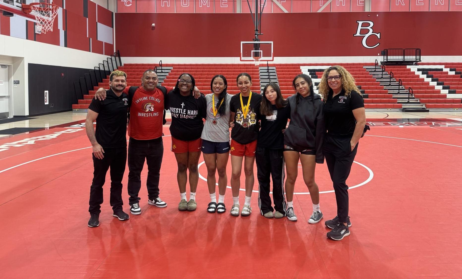 The Skyline women’s wrestling team poses in Bakersfield after competing on Saturday, March 21.