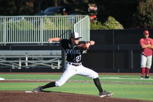 Skyline freshman pitcher Declan Mendel throws in ninth inning against De Anza.